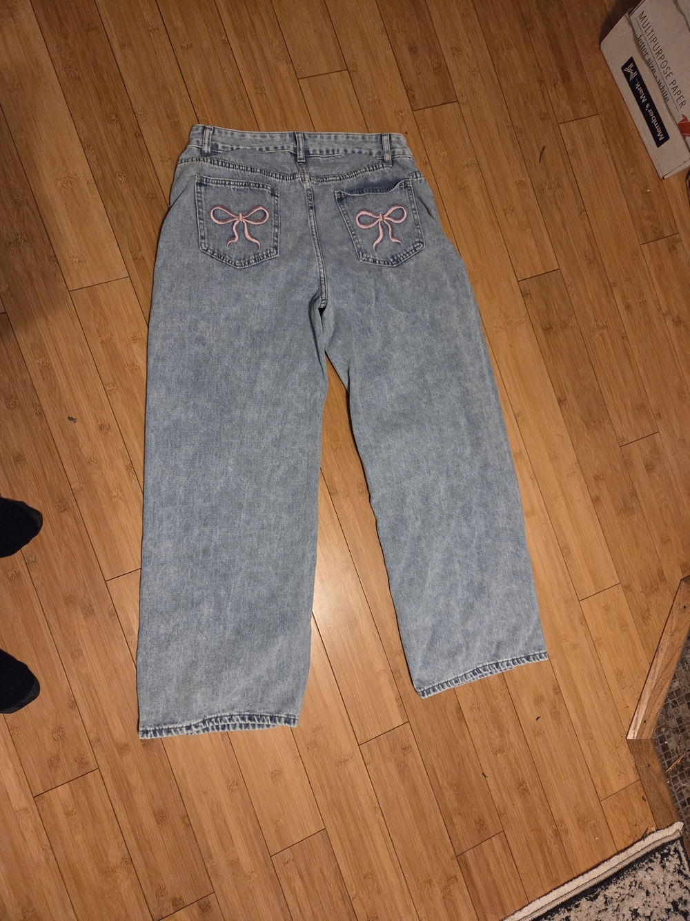 Light Wash Junior Ladies Size 11 Jeans with Pink Bow Back Pockets